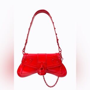 Poppy Lissiman Merlin Bag in Red Patent Leather
EUC